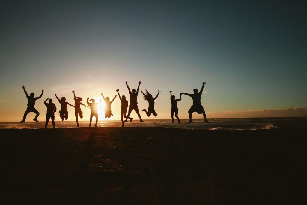 silhouette photography of group of people jumping during 1000445 1024x683 - Home